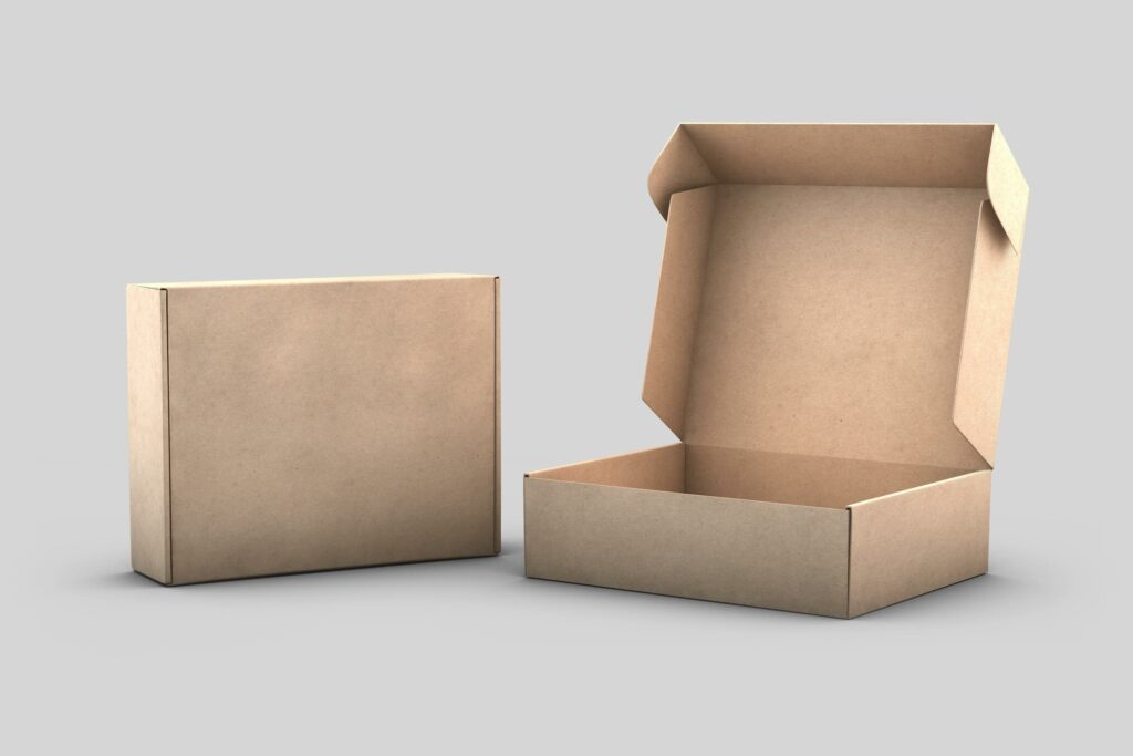 pexels photo 8066709 8066709 Two cardboard boxes, one closed and one open, on a white background for packaging concepts.